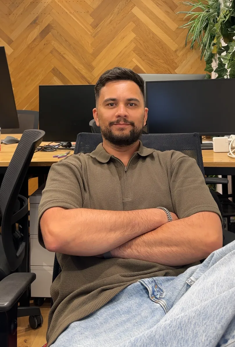 Tony Yemelyanov seated in an office